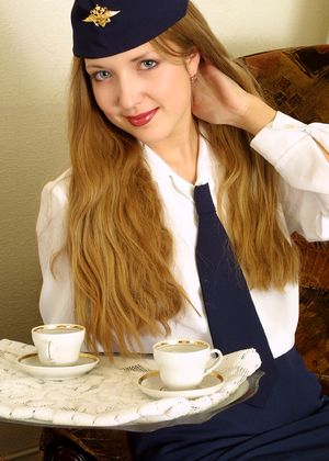Nastia is a naughty coed in her uniform stripping from ATK Archives Nastia from ATK Archives
