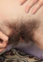 Slaviana pulls her dark fur open to show off the pink., Slaviana (rea006) ATK Natural & Hairy: Slaviana (Slaviana pulls her dark fur open to show off the pink.)