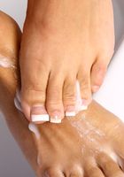 Tan babe Traci rubs lotion all over her feet, Traci (tra009) ATK Archives: Traci (Tan babe Traci rubs lotion all over her feet)